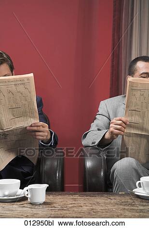 two men reading business papers View Large Photo Image Stock Image - two men reading business papers. Fotosearch