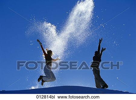 young couple jumping for joy on mountain View Large Photo Image Stock Image - young couple jumping for joy on mountain. Fotosearch