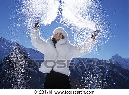 young woman in winter clothes enjoying the snow View Large Photo Image Stock Image - young woman in winter clothes enjoying the snow. Fotosearch
