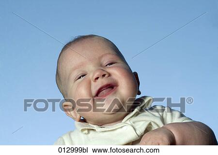 Stock Image - baby clothes, Vladimir Godnik, baby, babies, artificial light, 6-12 months. Fotosearch