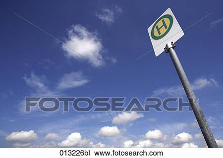 Stock Image - Germany, Halasz + Burow, blue sky, bus stop, bus stops, cloud, clouds. Fotosearch