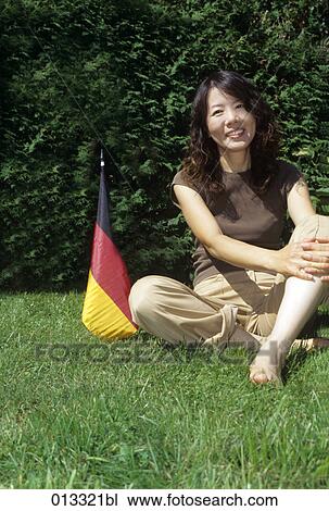 Stock Image - Germany, Tumi, adults, asian. Fotosearch