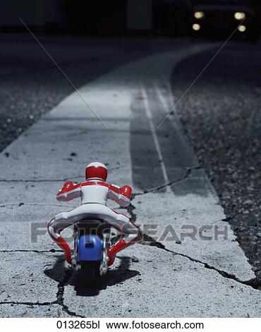 Stock Image - Halasz + Burow, alcoholism, asphalt, beginner, close-up. Fotosearch