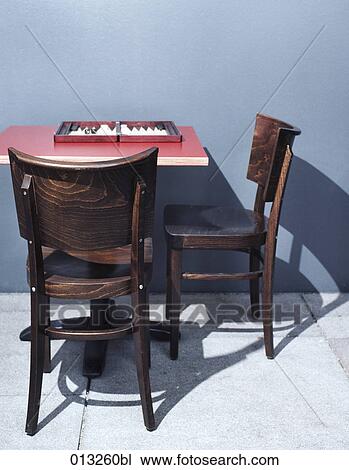 Stock Image - Halasz + Burow, artificial light, backgammon, chair, chairs. Fotosearch