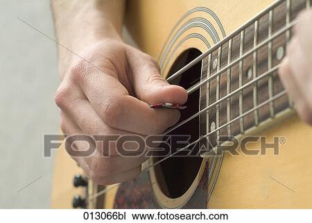 Stock Image - Vladimir Godnik, accuracy, artificial light, body detail, body details, body part, body parts. Fotosearch