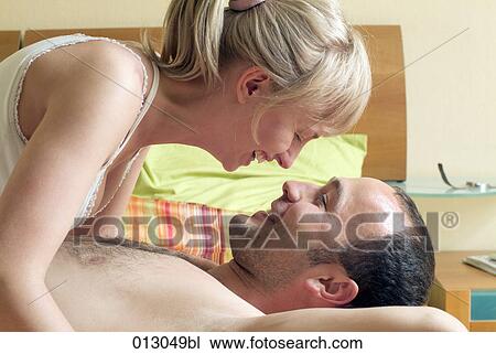 Vladimir Godnik, adults, artificial light, bed View Large Photo Image Stock Image - Vladimir Godnik, adults, artificial light, bed. Fotosearch