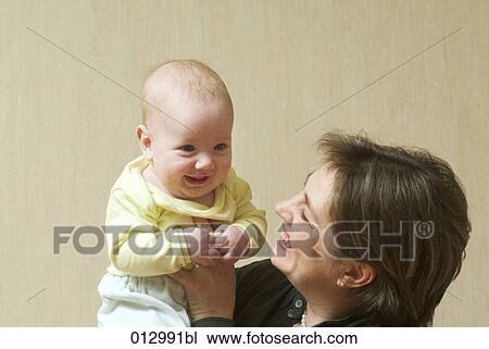 Vladimir Godnik, babies, artificial light, adults, 6-12 months View Large Photo Image Stock Image - Vladimir Godnik, babies, artificial light, adults, 6-12 months. Fotosearch