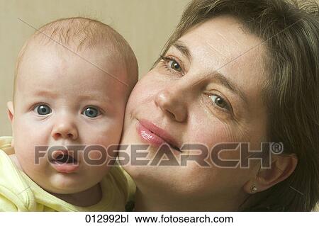 Stock Image - Vladimir Godnik, babies, artificial light, adults, 6-12 months. Fotosearch