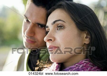 close-up of young couple leaning their heads together View Large Photo Image Stock Image - close-up of young couple leaning their heads together. Fotosearch