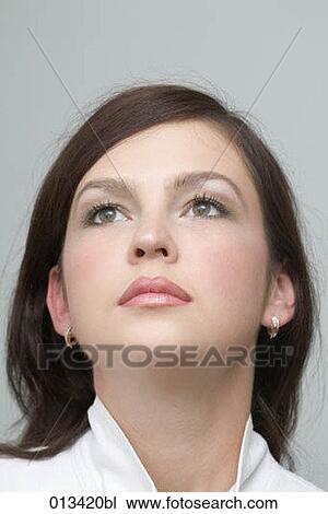 Stock Image - close-up portrait of young woman. Fotosearch