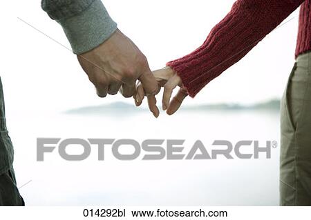 detail of couple cautiously touching hands View Large Photo Image Stock Image - detail of couple cautiously touching hands. Fotosearch
