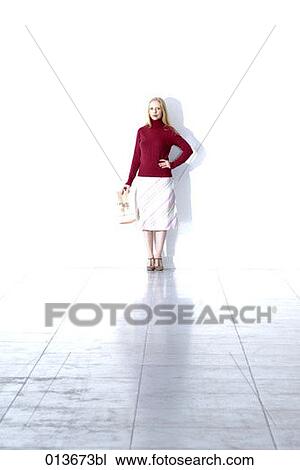 full body portrait of businesswoman with newspaper View Large Photo Image Stock Image - full body portrait of businesswoman with newspaper. Fotosearch