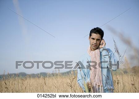 man with thoughtful expression talking on cellphone View Large Photo Image Stock Image - man with thoughtful expression talking on cellphone. Fotosearch