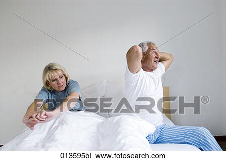 mature couple awaking in the morning View Large Photo Image Stock Image - mature couple awaking in the morning. Fotosearch