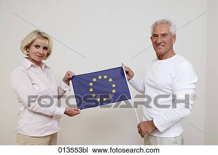 mature man and mature woman showing flag of European Union View Large Photo Image Stock Image - mature man and mature woman showing flag of European Union. Fotosearch