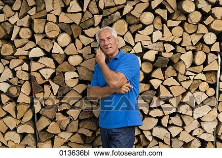 mature man talking on moblie phone View Large Photo Image Stock Image - mature man talking on moblie phone. Fotosearch