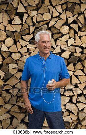 mature man with ipod View Large Photo Image Stock Image - mature man with ipod. Fotosearch