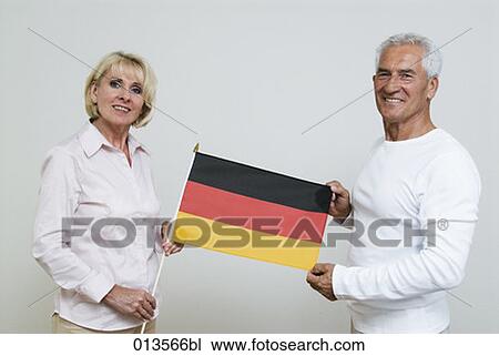 mature woman and man showing flag of Germany View Large Photo Image Stock Image - mature woman and man showing flag of Germany. Fotosearch