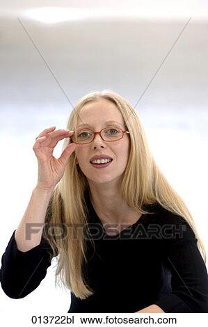 portrait of blonde with spectacles View Large Photo Image Stock Image - portrait of blonde with spectacles. Fotosearch
