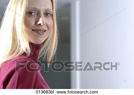 Stock Image - portrait of confident young businesswoman. Fotosearch