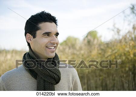 portrait of content young man in autumn View Large Photo Image Stock Image - portrait of content young man in autumn. Fotosearch