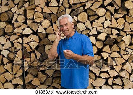 portrait of mature man with cellphone View Large Photo Image Stock Image - portrait of mature man with cellphone. Fotosearch