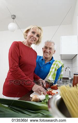 portrait of mature woman and husband in kitchen View Large Photo Image Stock Image - portrait of mature woman and husband in kitchen. Fotosearch