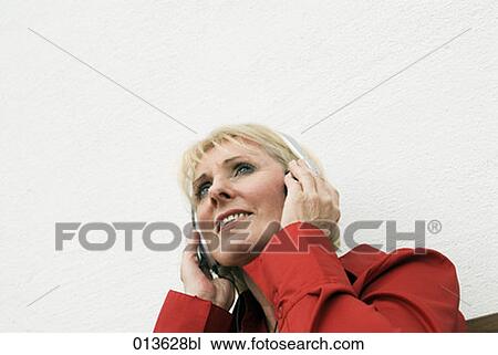 portrait of mature woman with headphones View Large Photo Image Stock Image - portrait of mature woman with headphones. Fotosearch