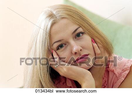 portrait of thoughtful looking young woman View Large Photo Image Stock Image - portrait of thoughtful looking young woman. Fotosearch