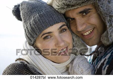 portrait of young couple in winter clothes View Large Photo Image Stock Image - portrait of young couple in winter clothes. Fotosearch