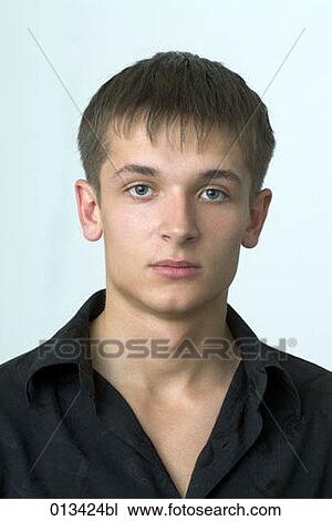 portrait of young man in black shirt View Large Photo Image Stock Image - portrait of young man in black shirt. Fotosearch