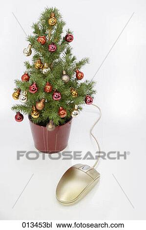 still life of christmas tree and golden computer mouse View Large Photo Image Stock Image - still life of christmas tree and golden computer mouse. Fotosearch
