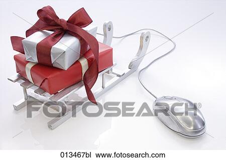 still life of computer mouse and christmas presents on sledge View Large Photo Image Stock Image - still life of computer mouse and christmas presents on sledge. Fotosearch
