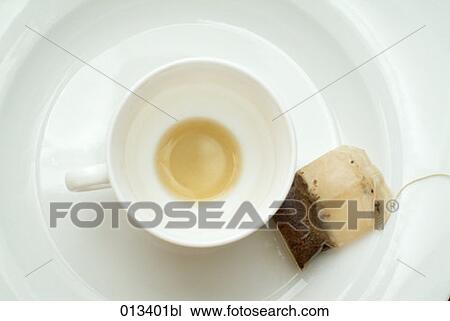 still life of empty tea cup and tea bag View Large Photo Image Stock Image - still life of empty tea cup and tea bag. Fotosearch