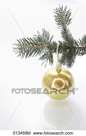 Stock Image - still life of golden bauble on christmas tree. Fotosearch