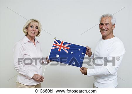 two mature people showing flag of Australia View Large Photo Image Stock Image - two mature people showing flag of Australia. Fotosearch