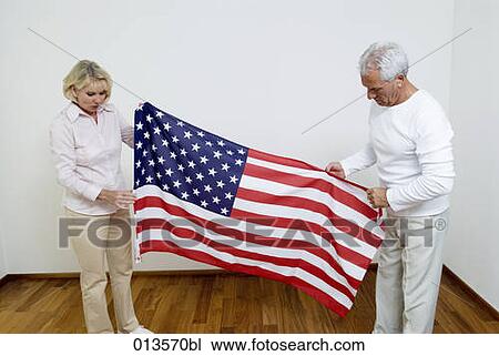 two mature people with American flag View Large Photo Image Stock Image - two mature people with American flag. Fotosearch