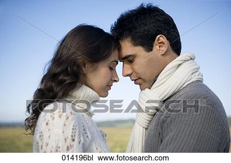young couple having a tender moment in autumn View Large Photo Image Stock Image - young couple having a tender moment in autumn. Fotosearch