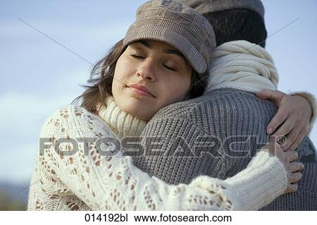 young woman dreaming on her husbands shoulder View Large Photo Image Stock Image - young woman dreaming on her husbands shoulder. Fotosearch