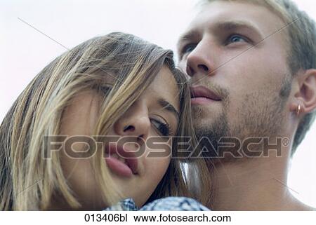 young woman leaning on boyfriend View Large Photo Image Stock Image - young woman leaning on boyfriend. Fotosearch