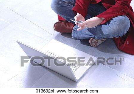 young woman writing text message on her mobile View Large Photo Image Stock Image - young woman writing text message on her mobile. Fotosearch