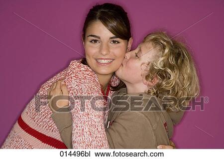 boy kissing his sister View Large Photo Image Stock Image - boy kissing his sister. Fotosearch