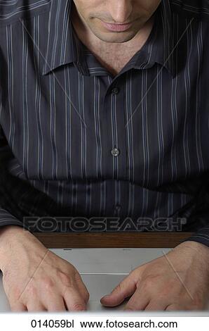close-up of man typing into his notebook computer View Large Photo Image Stock Image - close-up of man typing into his notebook computer. Fotosearch