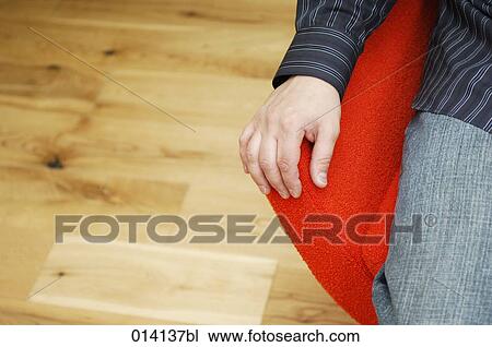 detail of young man sitting in red lounge chair View Large Photo Image Stock Image - detail of young man sitting in red lounge chair. Fotosearch