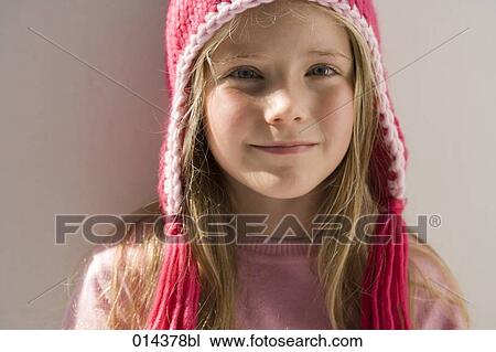 girl wearing pink hat looking at camera View Large Photo Image Stock Image - girl wearing pink hat looking at camera. Fotosearch