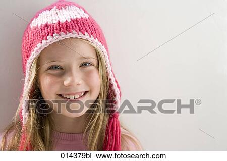 girl with pink woollen hat smiling View Large Photo Image Stock Image - girl with pink woollen hat smiling. Fotosearch