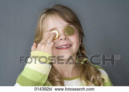 little girl in green covering her eyes with Euro coins View Large Photo Image Stock Image - little girl in green covering her eyes with Euro coins. Fotosearch