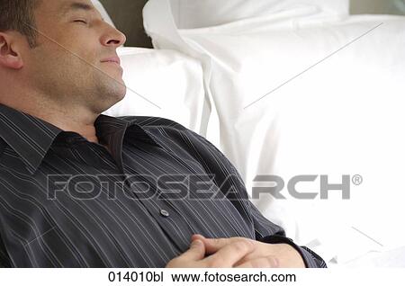 portrait of businessman taking a nap View Large Photo Image Stock Image - portrait of businessman taking a nap. Fotosearch
