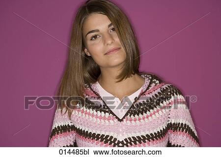 Stock Image - portrait of confident looking teenage girl. Fotosearch