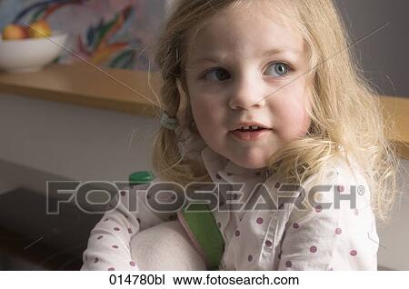 portrait of curious looking little girl View Large Photo Image Stock Image - portrait of curious looking little girl. Fotosearch